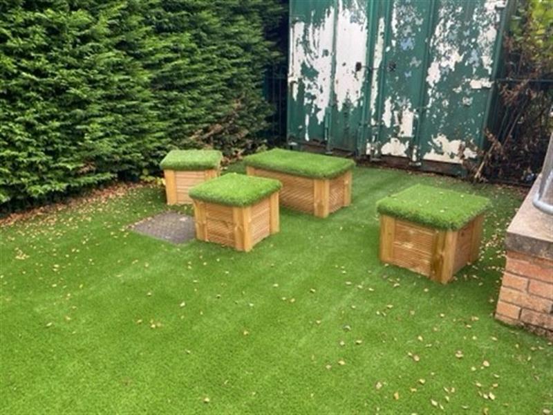 the timber seats with artificial grass topping for comfort