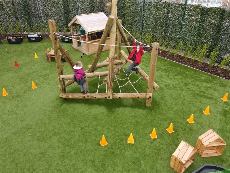 children play on the timber harter fell climber