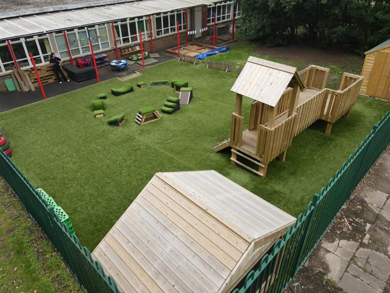 birdseye view of drawing hut, modular play tower, get set, go blocks and artificial grass