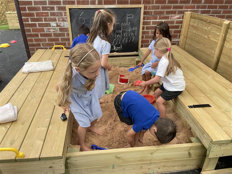 children playing in the sandbox