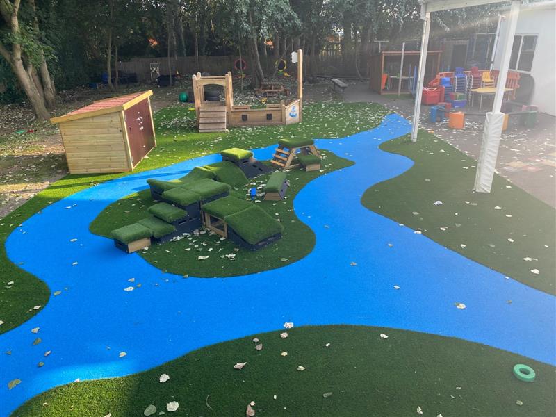 a view of the whole playground with surfacing and self selecting store