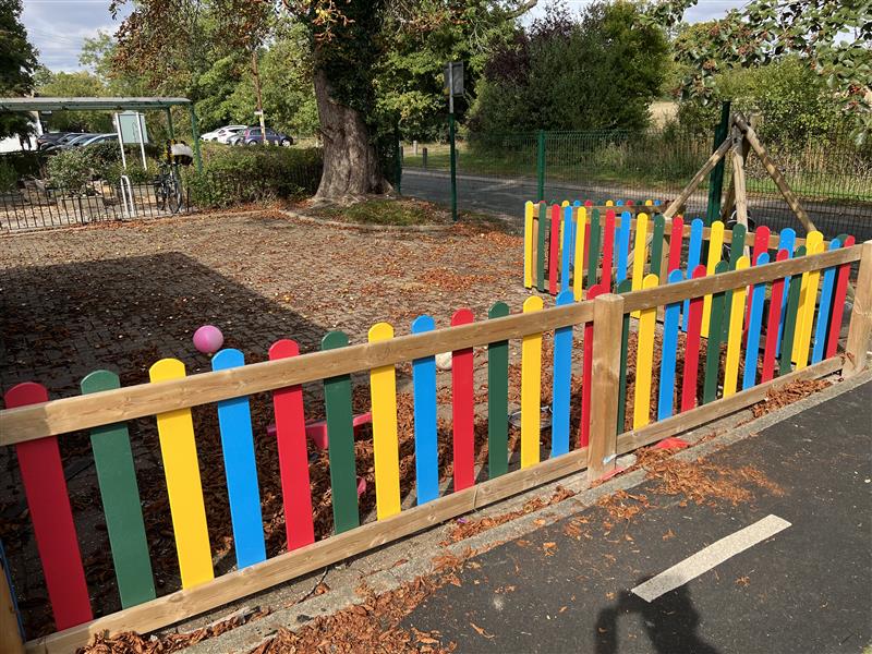coloured fencing in the primary school playground