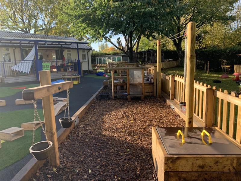 A messy play area installed into a nursery garden 