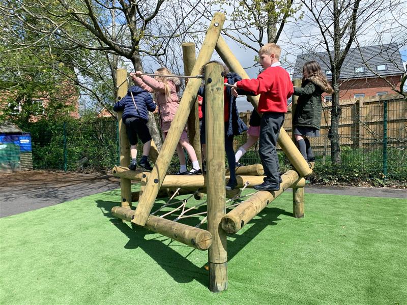 a few children playing on our pinacle climbing frame