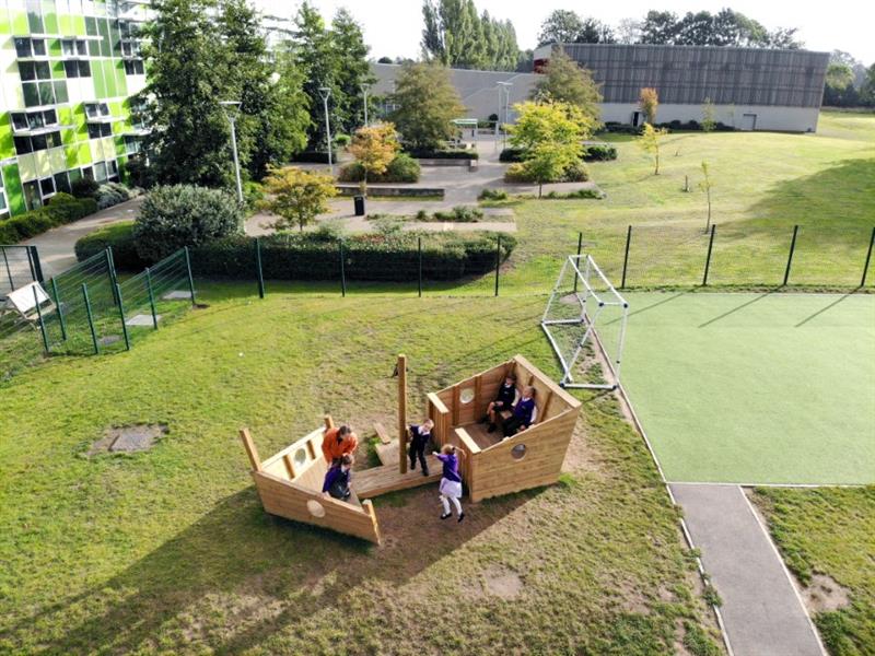Children playing on a playground play ship