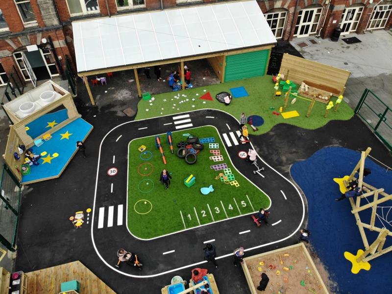 a birdseye view of a bright and colourful pentagon play roadway
