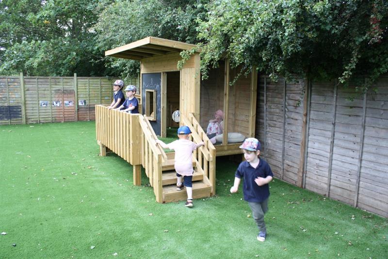 children play in their new lookout cabin and talk to their friends 