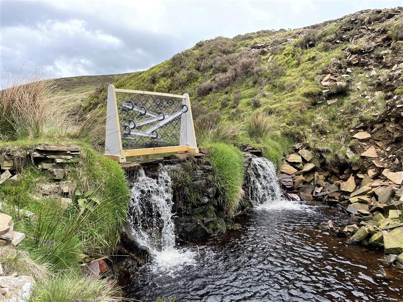 a view of the water wall on shutlingsloe