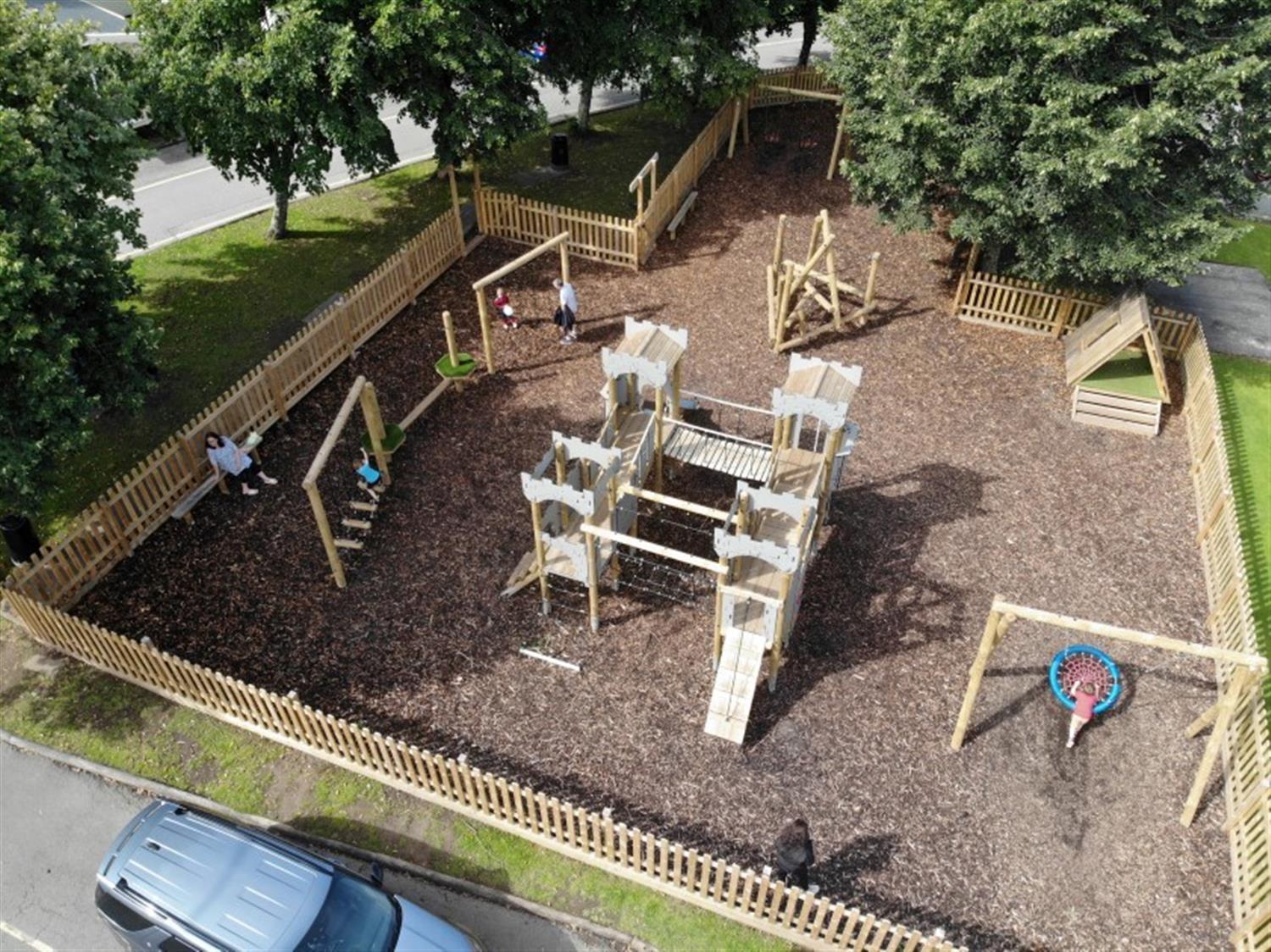 A picture taken from a drone showing a birds-eye view of the outdoor play area that Pentagon Play made for Brynteg Holiday Park