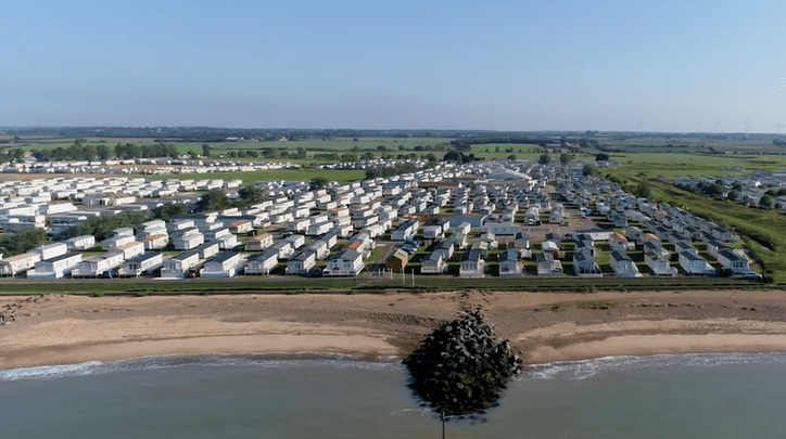 Birdseye shot of St Osyths Beach Holiday Park, showcasing the size of the park. A lot of caravans can be seen.