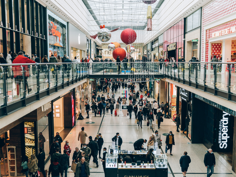 A huge shopping centre that has a variety of big shops established within the centre. Christmas decorations can be seen all across the shopping centre.