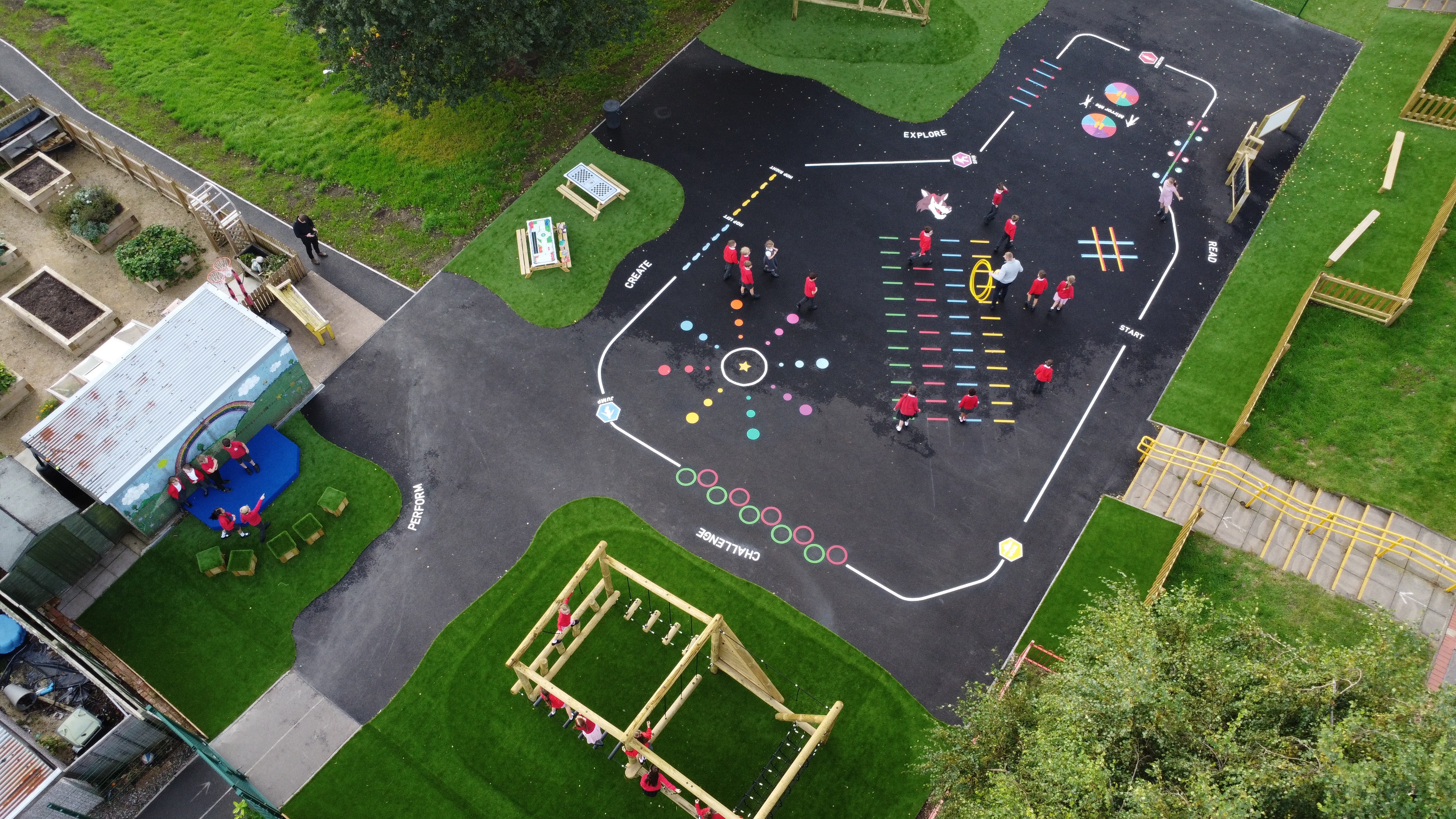 A variety of thermoplastic markings can be seen on the playground, with all the different areas being showcased too.