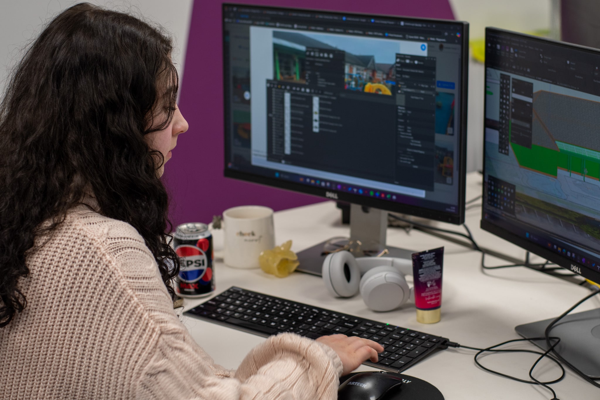 Isabelle Wood working on her desktop as she designs a playground visualisation