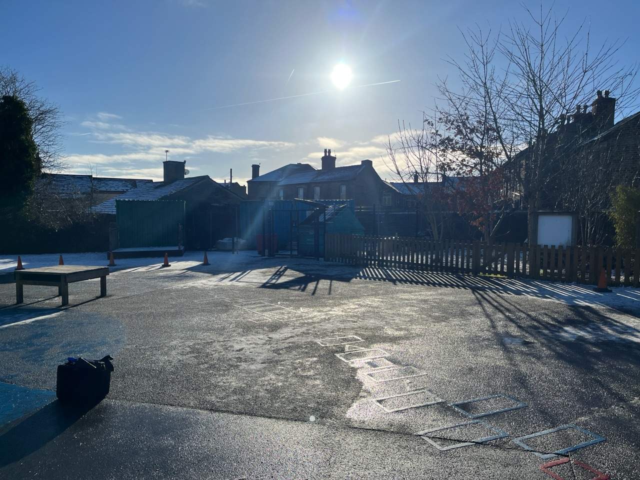 The old tarmac playground at Wibsey Primary School covered in ice.