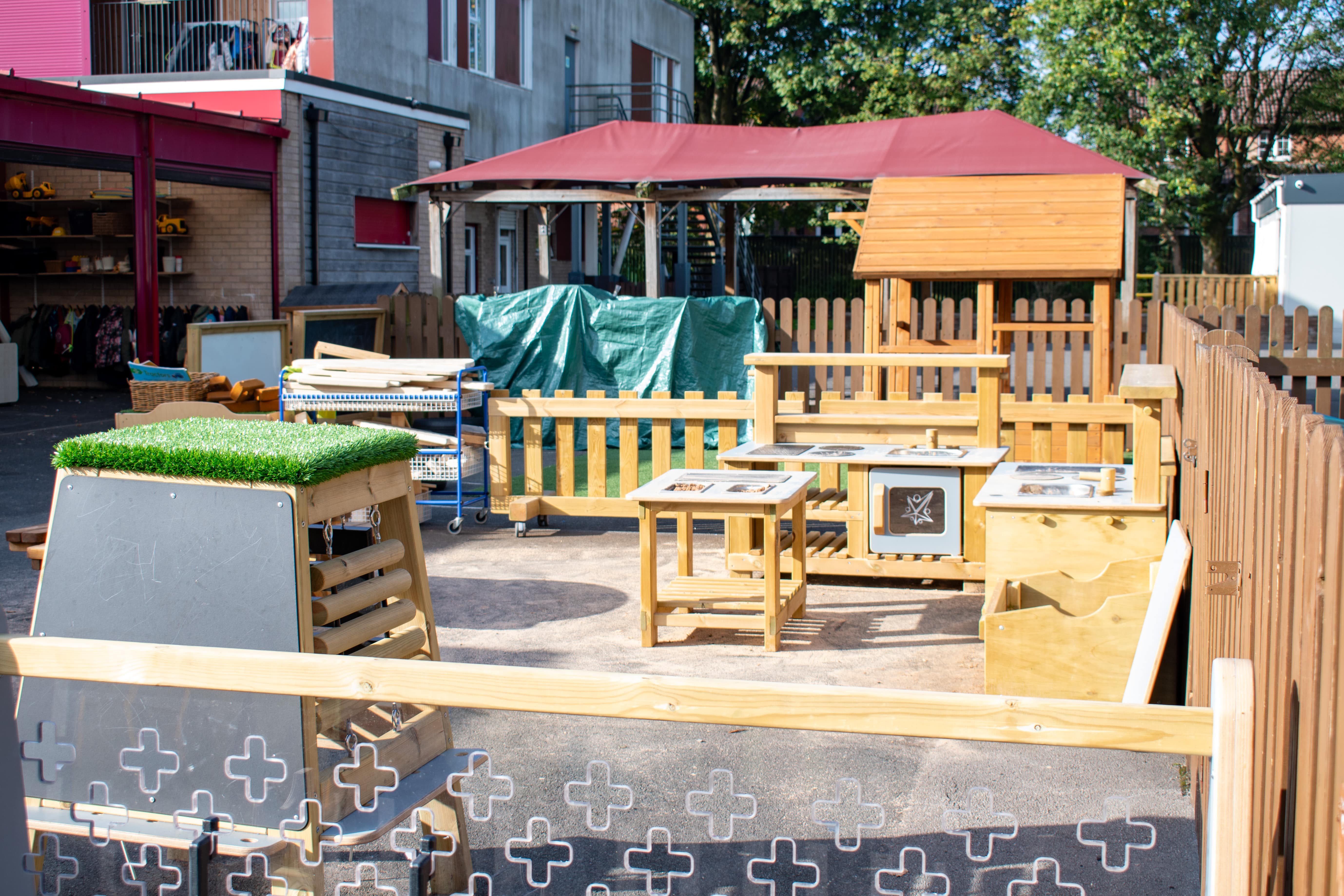 A playground made up from a variety of freestanding play equipment.