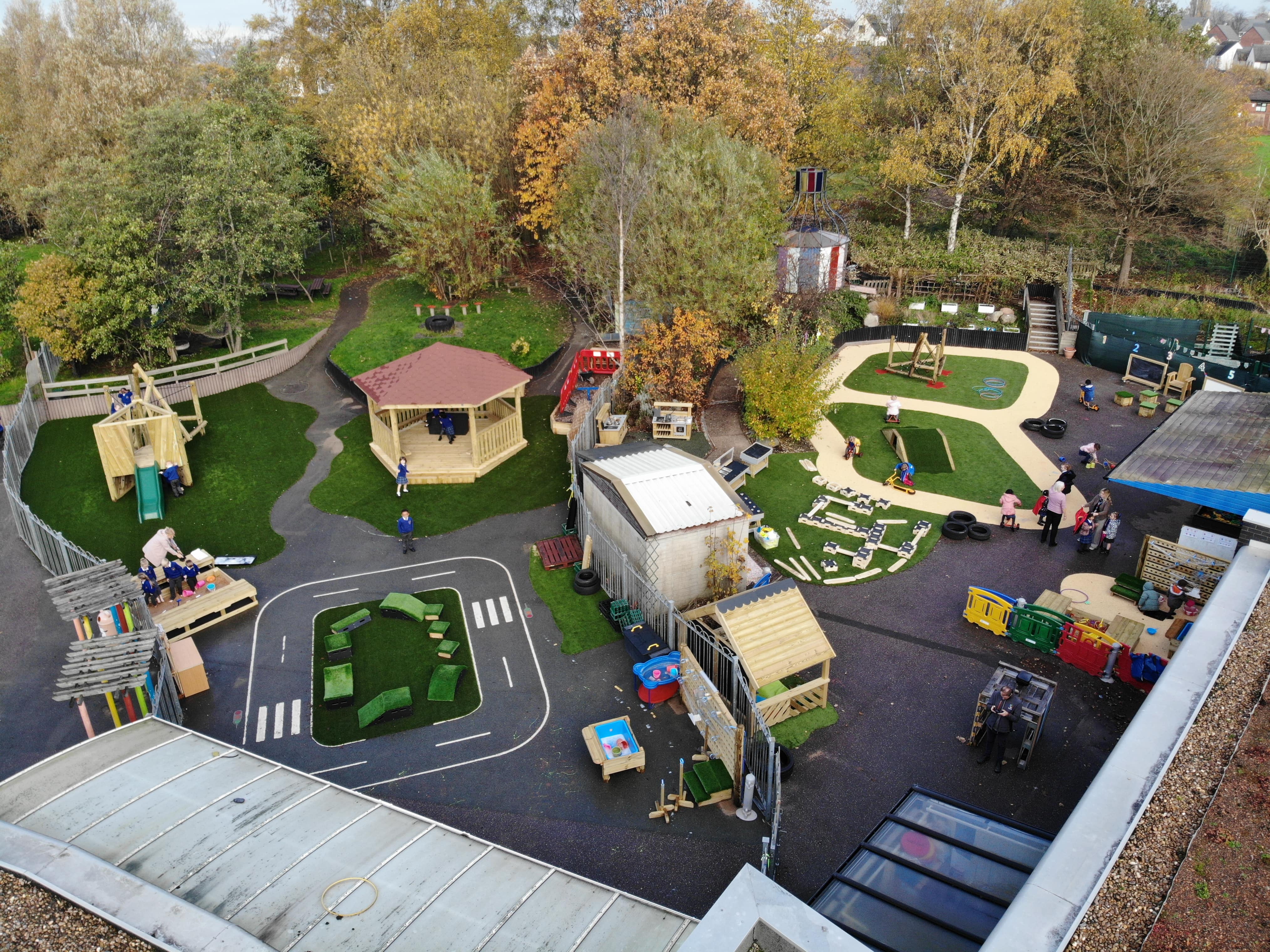 A birdseye image of the new playground at Kingsland Academy, featuring a variety of unique and exciting pieces of playground equipment.