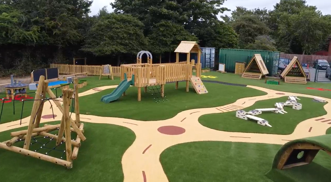 A general overview of the new playground at Timbertree Primary, showing all of the new and exciting play equipment and surfacing.