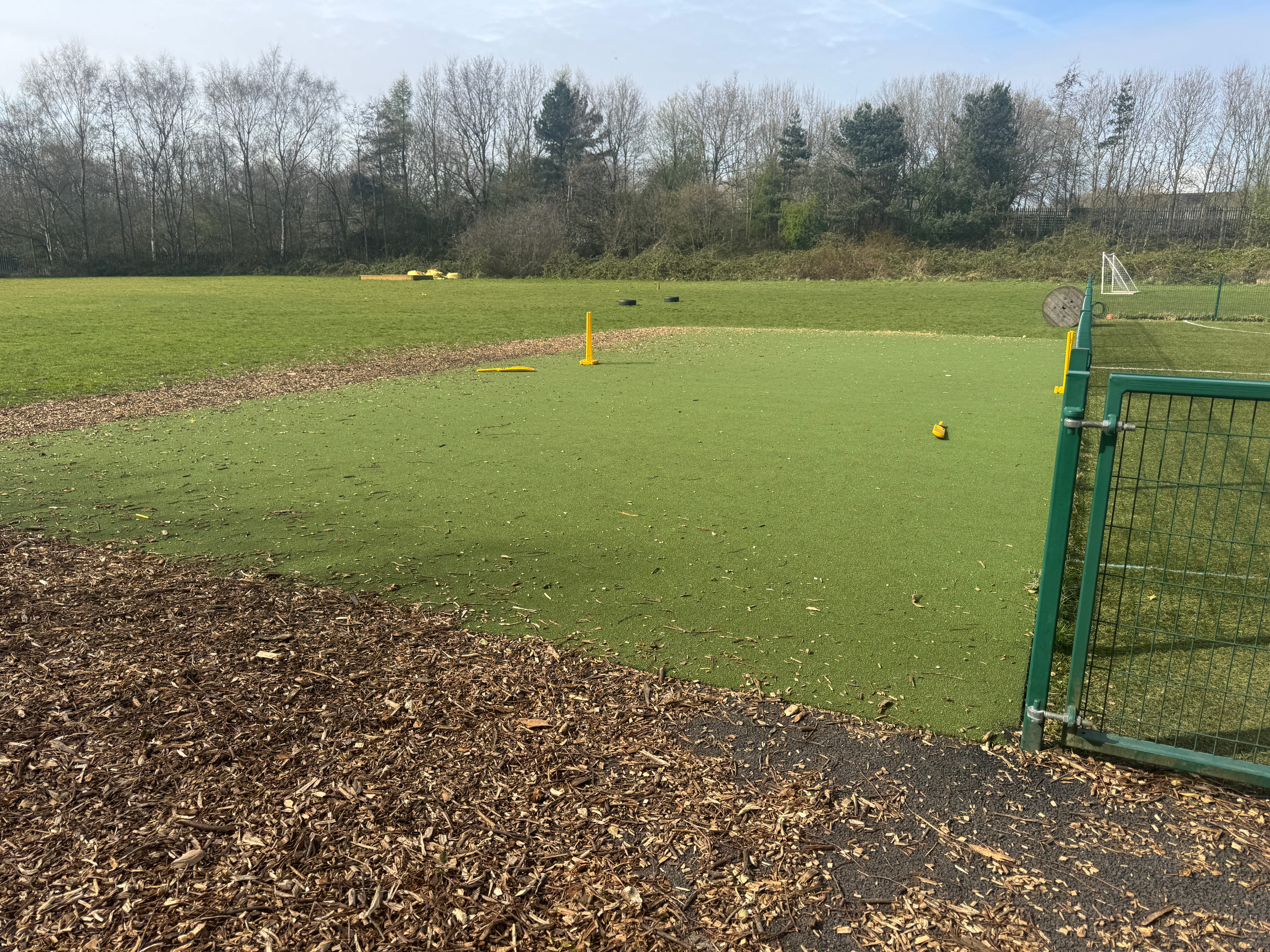 A patch of artificial grass that has been installed beside the Multi-use Games Area at Ashton Primary School.