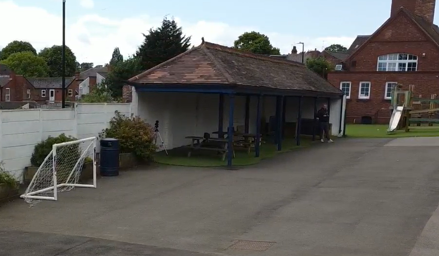 The existing canopy that now has benches placed underneath it for lunches.