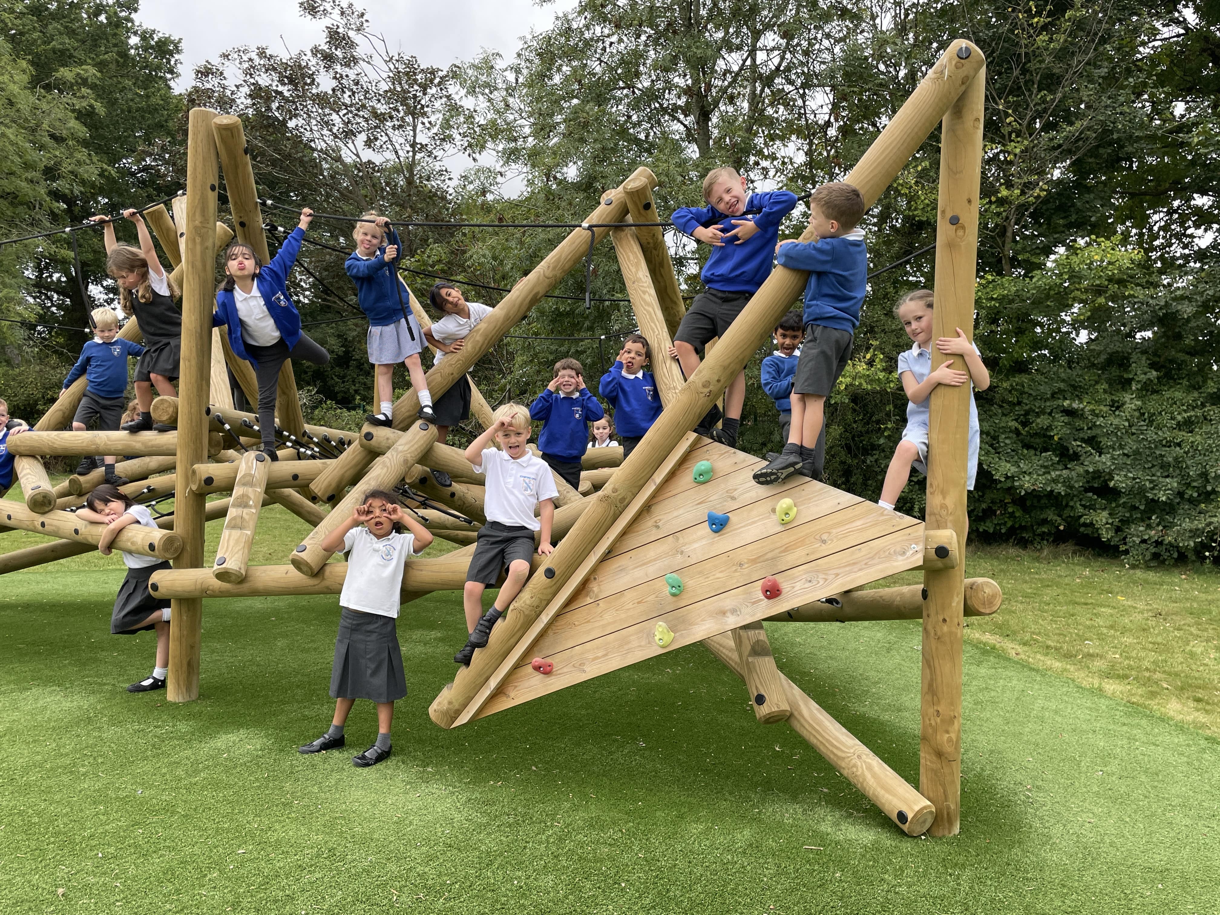 A photo taken from the right side of the Crinkle Crags, showcasing how much the kids enjoy the play equipment.